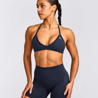 EnhanceLift™ Seamless Minimal Halter Neck Bralette with Gray Logo | True Blue