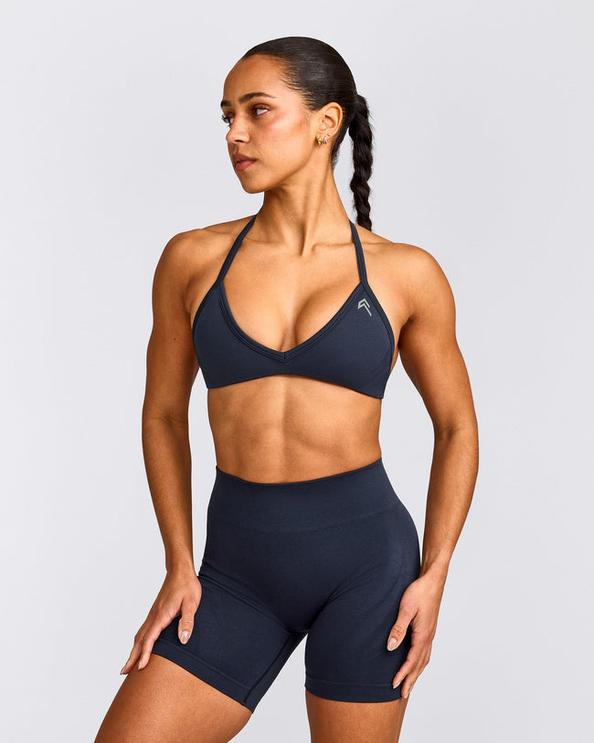 EnhanceLift™ Seamless Minimal Halter Neck Bralette with Gray Logo | True Blue