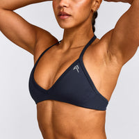 EnhanceLift™ Seamless Minimal Halter Neck Bralette with Gray Logo | True Blue