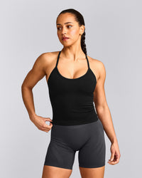 EnhanceLift™ Seamless Strappy Racer Tank Top with Built in Bra Shelf with Gray Logo | Black