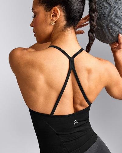 EnhanceLift™ Seamless Strappy Racer Tank Top with Built in Bra Shelf with Gray Logo | Black