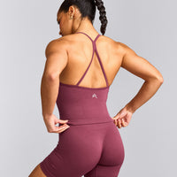 EnhanceLift™ Seamless Strappy Racer Tank Top with Built in Bra Shelf with Gray Logo | Burnt Maroon