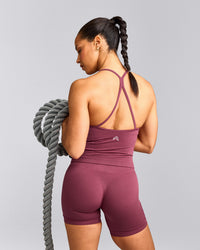 EnhanceLift™ Seamless Strappy Racer Tank Top with Built in Bra Shelf with Gray Logo | Burnt Maroon