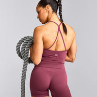 EnhanceLift™ Seamless Strappy Racer Tank Top with Built in Bra Shelf with Gray Logo | Burnt Maroon