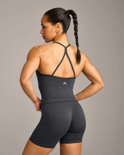 EnhanceLift™ Seamless Strappy Racer Tank Top with Built in Bra Shelf with Gray Logo | Coal