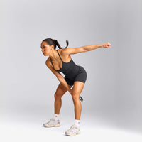 EnhanceLift™ Seamless Strappy Racer Tank Top with Built in Bra Shelf with Gray Logo | Coal