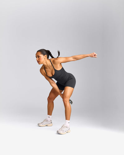 EnhanceLift™ Seamless Strappy Racer Tank Top with Built in Bra Shelf with Gray Logo | Coal