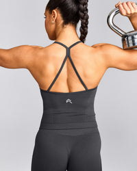 EnhanceLift™ Seamless Strappy Racer Tank Top with Built in Bra Shelf with Gray Logo | Coal