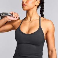 EnhanceLift™ Seamless Strappy Racer Tank Top with Built in Bra Shelf with Gray Logo | Coal