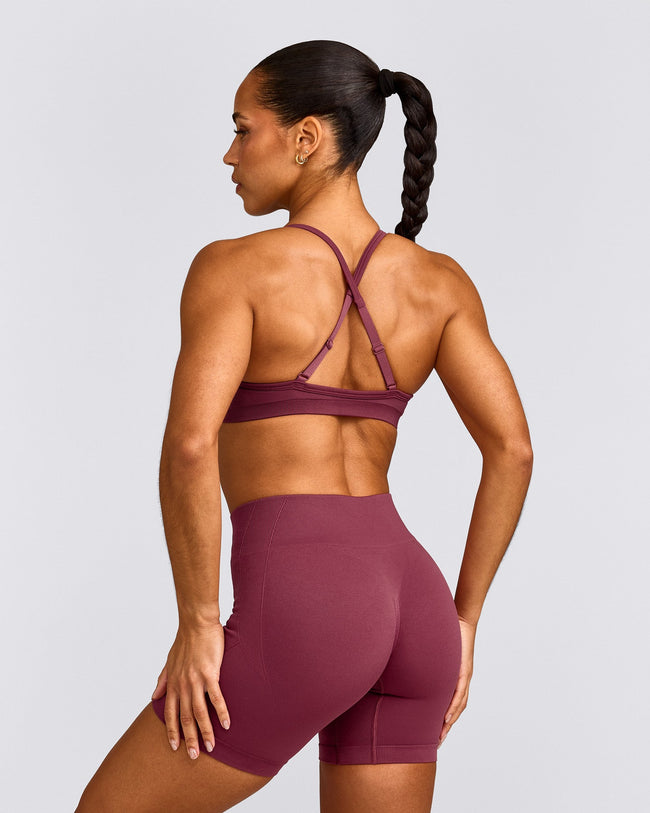 EnhanceLift™ Seamless Strappy Sports Bra with Gray Logo | Burnt Maroon