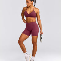 EnhanceLift™ Seamless Strappy Sports Bra with Gray Logo | Burnt Maroon