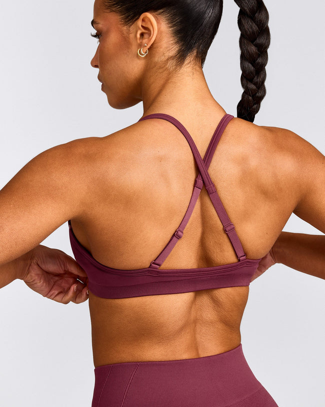 EnhanceLift™ Seamless Strappy Sports Bra with Gray Logo | Burnt Maroon