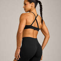 EnhanceLift™ Seamless Strappy Sports Bra with Gray Logo | Black