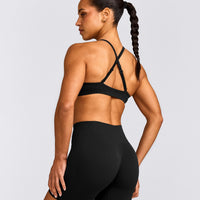 EnhanceLift™ Seamless Strappy Sports Bra with Gray Logo | Black