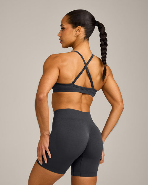 EnhanceLift™ Seamless Strappy Sports Bra with Gray Logo | Coal