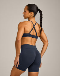 EnhanceLift™ Seamless Strappy Sports Bra with Gray Logo | True Blue
