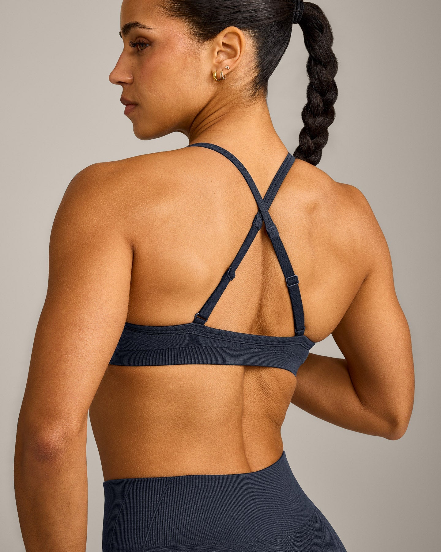 EnhanceLift™ Seamless Strappy Sports Bra with Gray Logo | True Blue