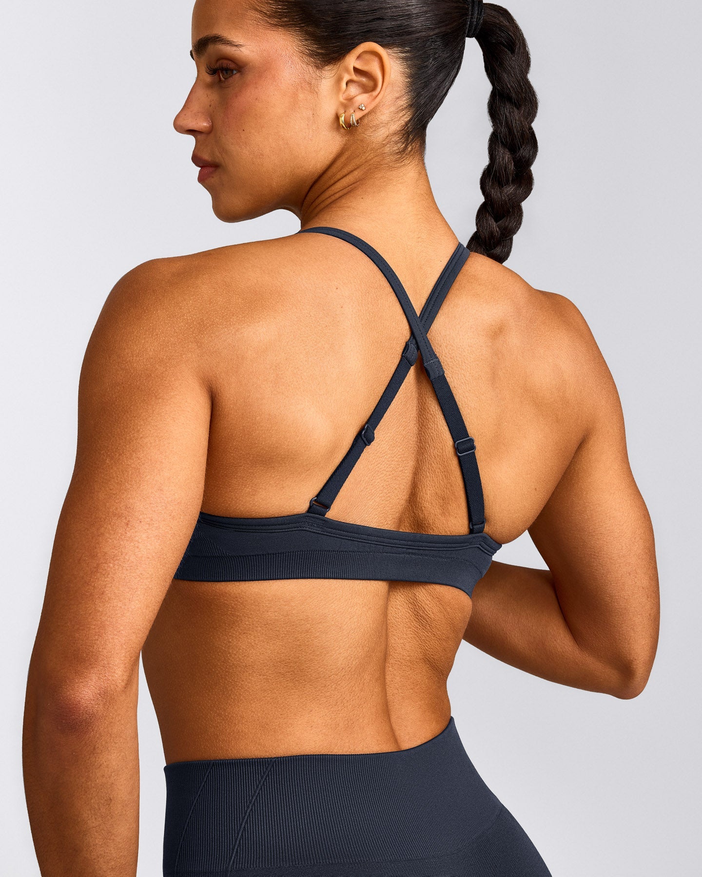 EnhanceLift™ Seamless Strappy Sports Bra with Gray Logo | True Blue