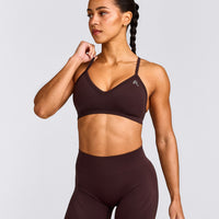 EnhanceLift™ Seamless Strappy Sports Bra with Gray Logo | Plum Brown