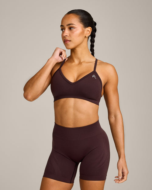 EnhanceLift™ Seamless Strappy Sports Bra with Gray Logo | Plum Brown