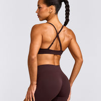 EnhanceLift™ Seamless Strappy Sports Bra with Gray Logo | Plum Brown