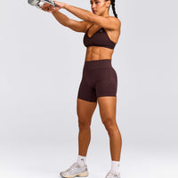 EnhanceLift™ Seamless Strappy Sports Bra with Gray Logo | Plum Brown