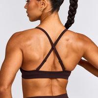 EnhanceLift™ Seamless Strappy Sports Bra with Gray Logo | Plum Brown