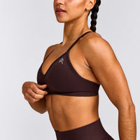 EnhanceLift™ Seamless Strappy Sports Bra with Gray Logo | Plum Brown