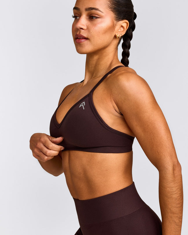 EnhanceLift™ Seamless Strappy Sports Bra with Gray Logo | Plum Brown