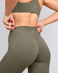 SoftMotion™ Flared Pants with Gray Logo | Alpine Green