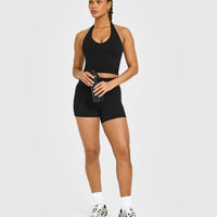 SoftMotion™ Halter Neck Mid Vest with Built in Bra Shelf with White Logo | Black