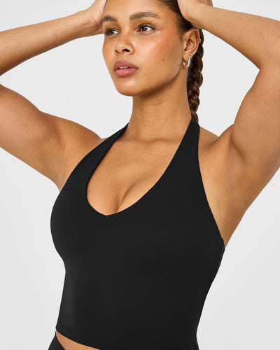 SoftMotion™ Halter Neck Mid Vest with Built in Bra Shelf with White Logo | Black