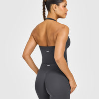 SoftMotion™ Halter Neck Mid Vest with Built in Bra Shelf with White Logo | Coal