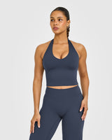 SoftMotion™ Halter Neck Mid Vest with Built in Bra Shelf with White Logo | True Blue
