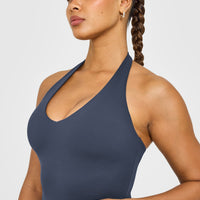 SoftMotion™ Halter Neck Mid Vest with Built in Bra Shelf with White Logo | True Blue
