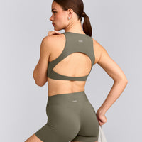 SoftMotion™ High Neck Sports Bra with Gray Logo | Alpine Green