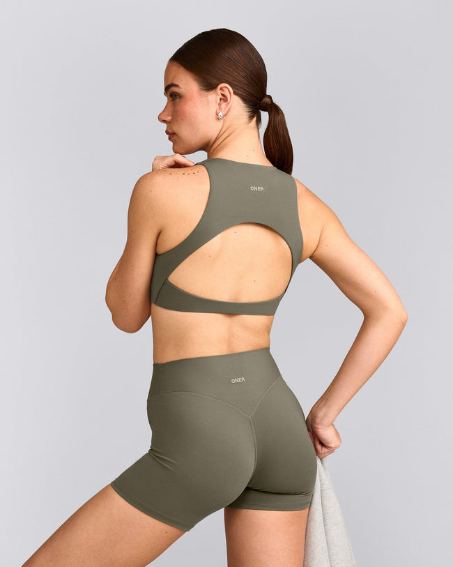 SoftMotion™ High Neck Sports Bra with Gray Logo | Alpine Green