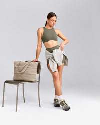 SoftMotion™ High Neck Sports Bra with Gray Logo | Alpine Green
