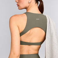 SoftMotion™ High Neck Sports Bra with Gray Logo | Alpine Green