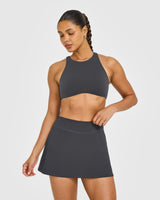 SoftMotion™ High Neck Sports Bra with White Logo | Coal