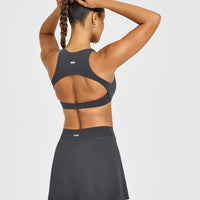 SoftMotion™ High Neck Sports Bra with White Logo | Coal