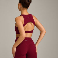 SoftMotion™ High Neck Sports Bra with Gray Logo | Ruby Red