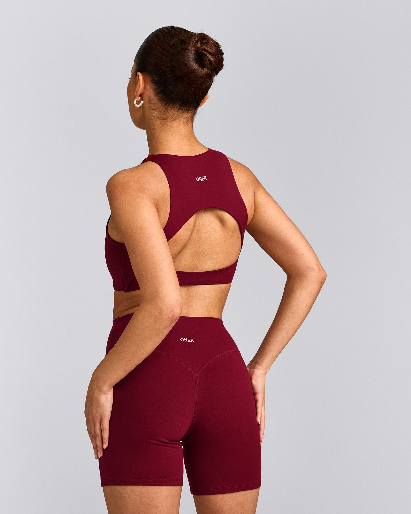 SoftMotion™ High Neck Sports Bra with Gray Logo | Ruby Red