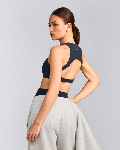 SoftMotion™ High Neck Sports Bra with Gray Logo | True Blue