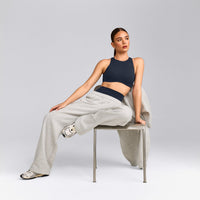 SoftMotion™ High Neck Sports Bra with Gray Logo | True Blue