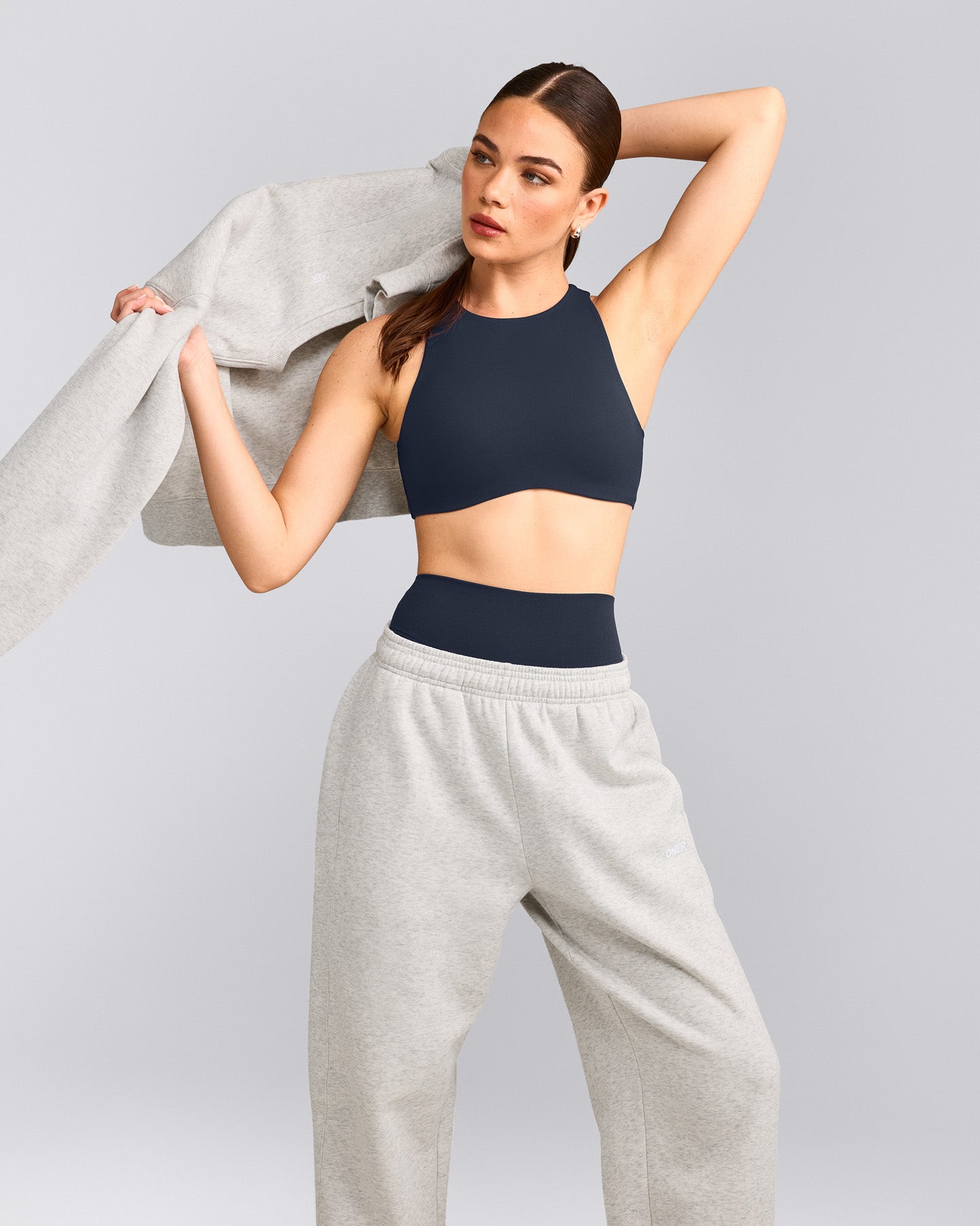 SoftMotion™ High Neck Sports Bra with Gray Logo | True Blue