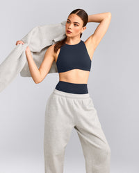 SoftMotion™ High Neck Sports Bra with Gray Logo | True Blue