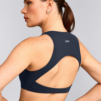 SoftMotion™ High Neck Sports Bra with Gray Logo | True Blue