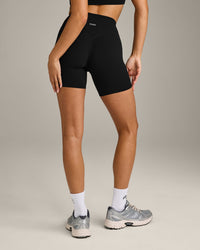 SoftMotion™ High Waisted Shorts 6" with Gray Logo | Black