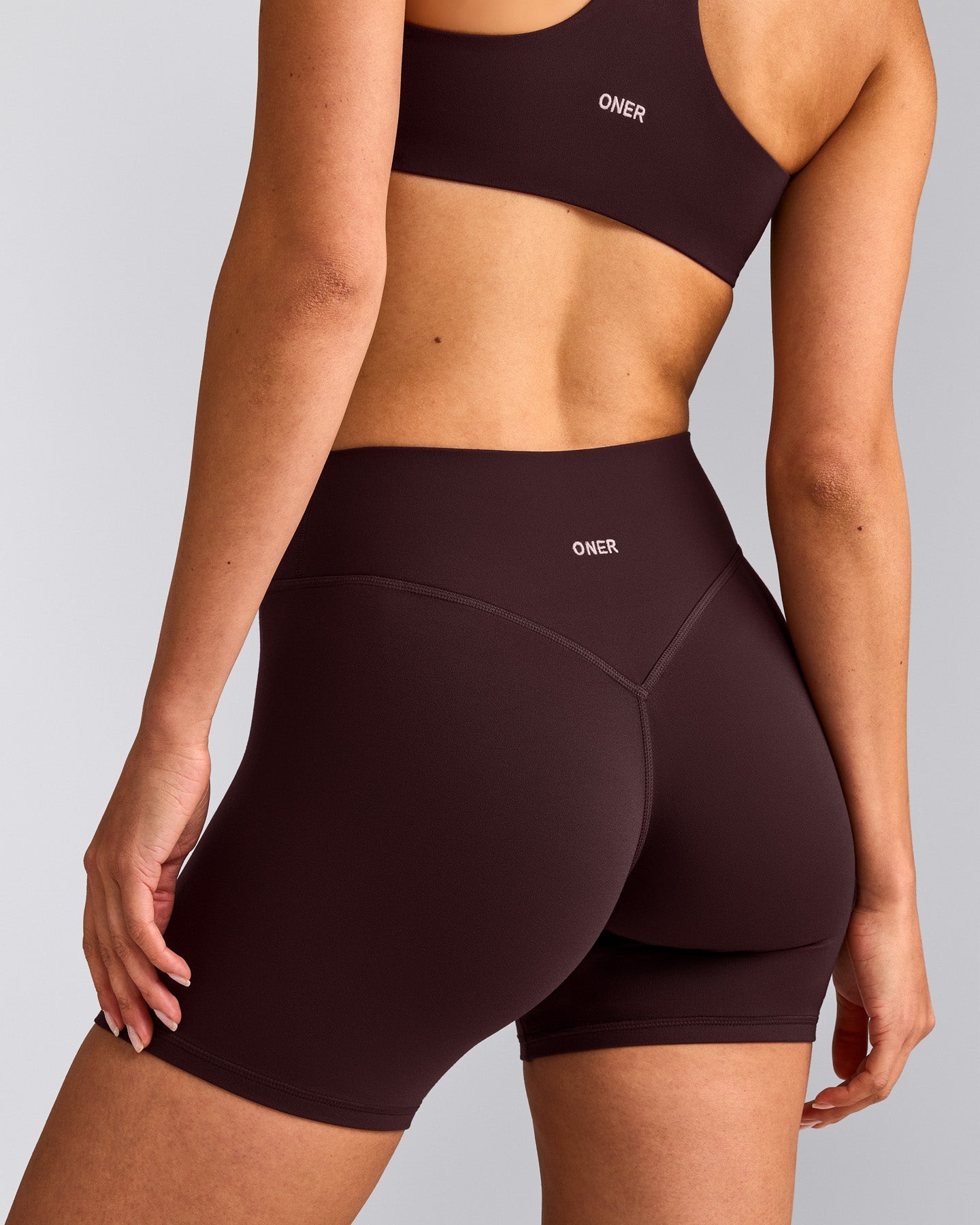 SoftMotion™ High Waisted Shorts 6" with Gray Logo | Plum Brown